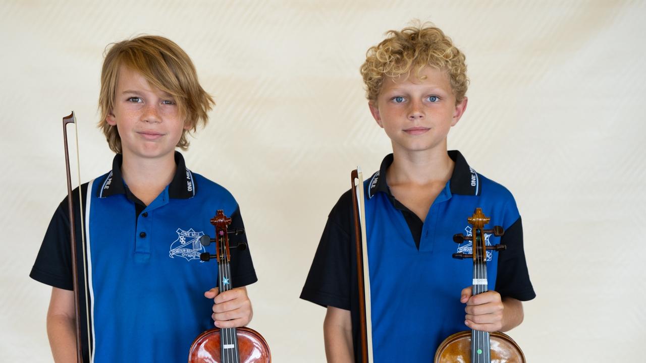 James Bryant and Alex Schuetze from One Mile State School prepare for the small instrumental ensemble strings (primary school) at the Gympie Eisteddfod. August 1, 2023. Picture: Christine Schindler