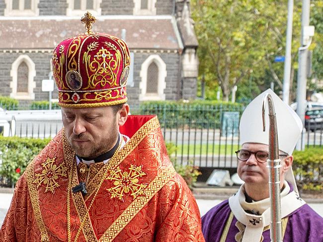 MELBOURNE, MARCH 2, 2022: Archbishop Peter Comensoli and Ukrainian Bishop Mykola Bychok attend mass at St Patrick's Cathedral. Picture: Mark Stewart