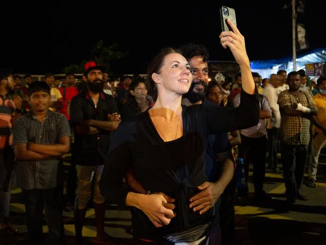 People learn of the resignation of former president Gotabaya Rajapaksa in Colombo. Picture: Abhishek Chinnappa / Getty Images