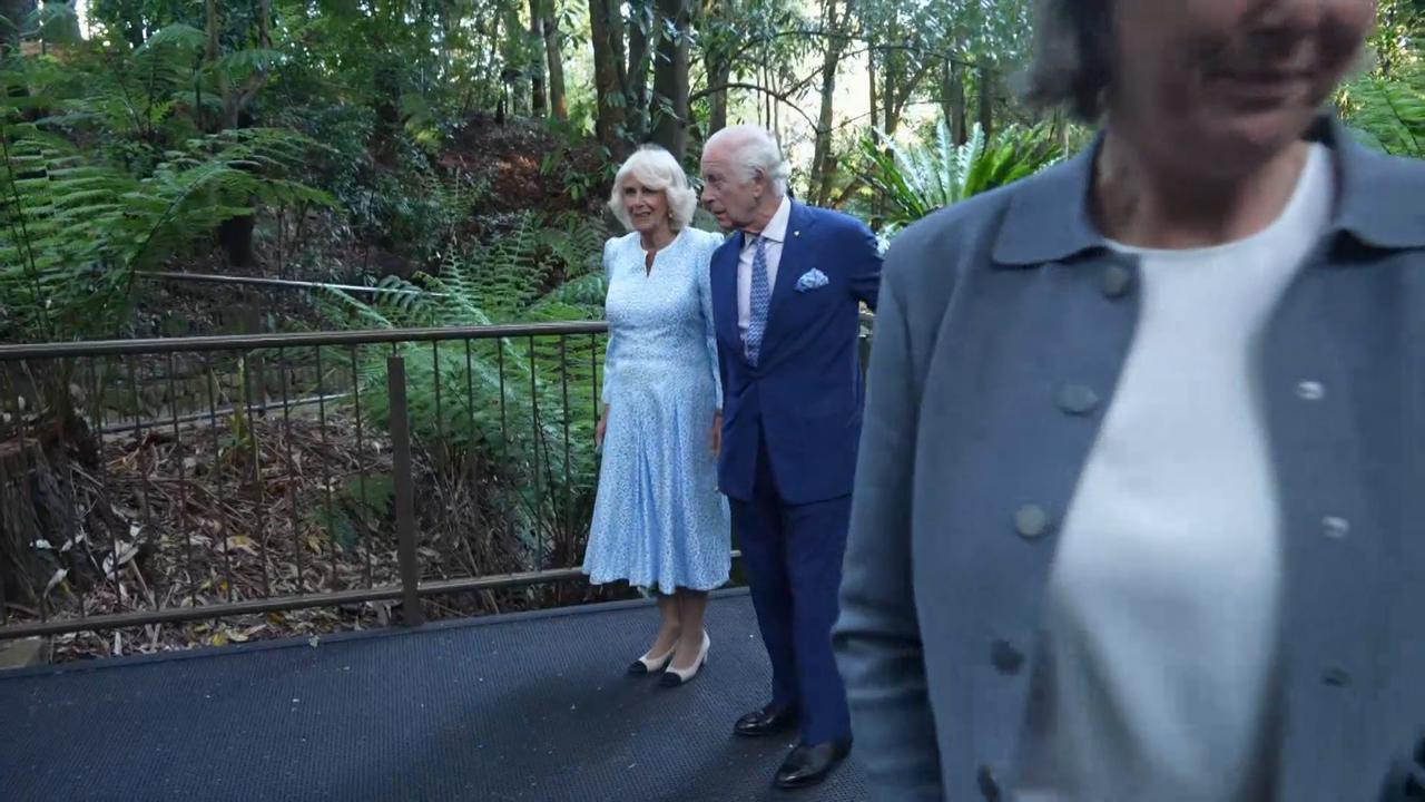 King Charles plants a tree during Australian visit