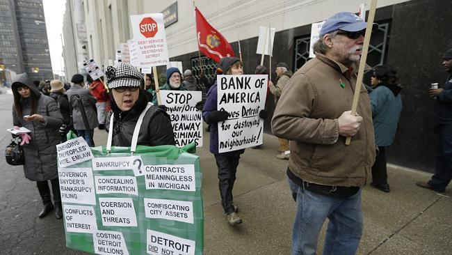 The economic situation has led to a wave of protests across the country, including outside the courtroom in Detroit. Picture: AP. 