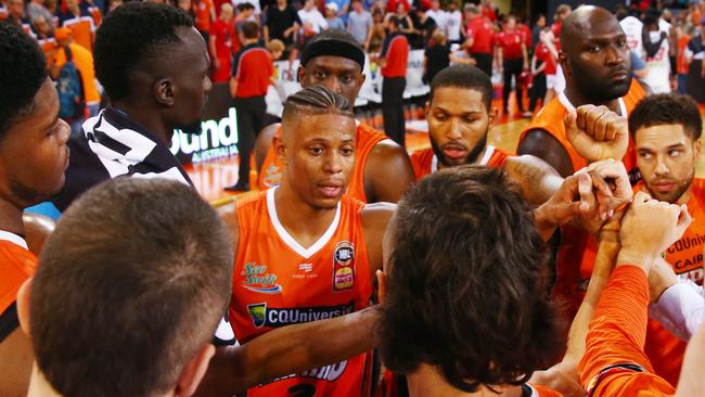 Taipans point guard Scott Machado leads a team huddle in the National Basketball League (NBL) match between the Cairns Taipans and the Perth Wildcats, held at the Cairns Convention Centre. PICTURE: BRENDAN RADKE