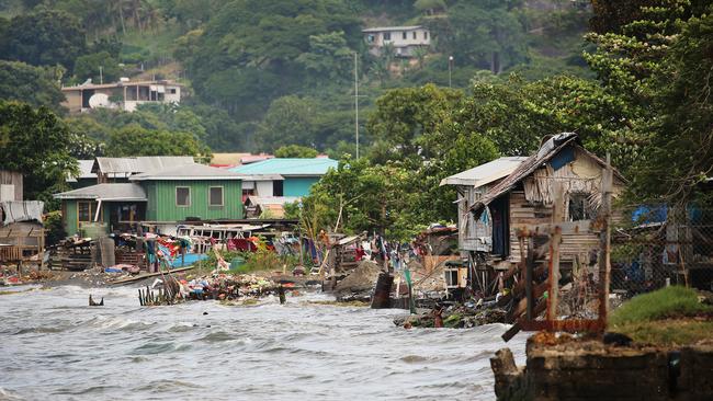 Less than 4kms from the centre of town and the Australian High Commission children and families wash and swim in sewage and rubbish in Honiara, Solomon Islands.