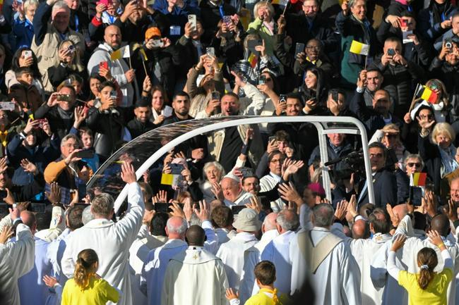 The Argentine pontiff, 87, arrived at the stadium in Brussels in bright morning sunshine