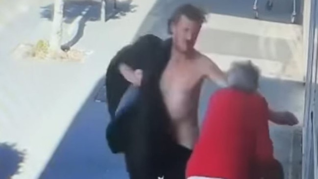 CCTV of a man who approached a 92-year-old in Douglas parade,  Williamstown hitting her and pushing her to the ground on Wednesday 30th of April. Source: Facebook , , Witnesses alleged the attack caused the woman to fall to the ground and lose consciousness.
