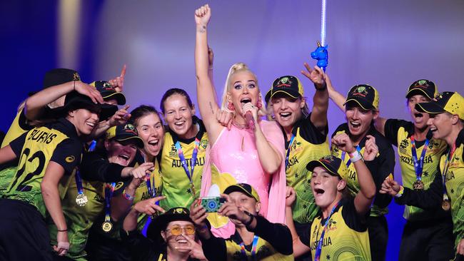 The Australian women's cricket team on stage with Katy Perry . Pic: Michael Klein