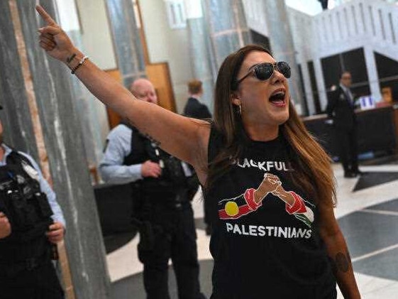 Independent Senator Lidia Thorpe protests inside the Marble Foyer at Parliament House in Canberra, Thursday, November 28, 2024. (AAP Image/Lukas Coch) NO ARCHIVING