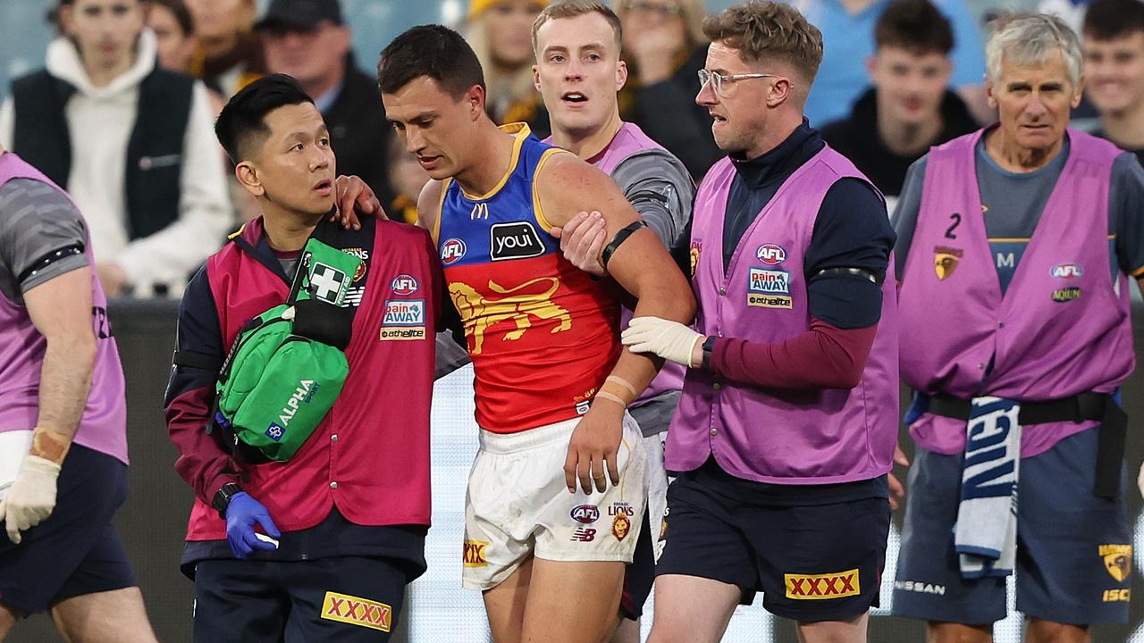 Hugh McCluggage is taken from the MCG after being concussed in a tackle. Picture: Robert Cianflone / Getty Images