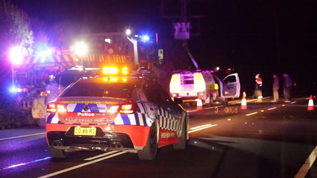 Police at the scene of the crash on The Northern Road. Picture: Bill Hearne