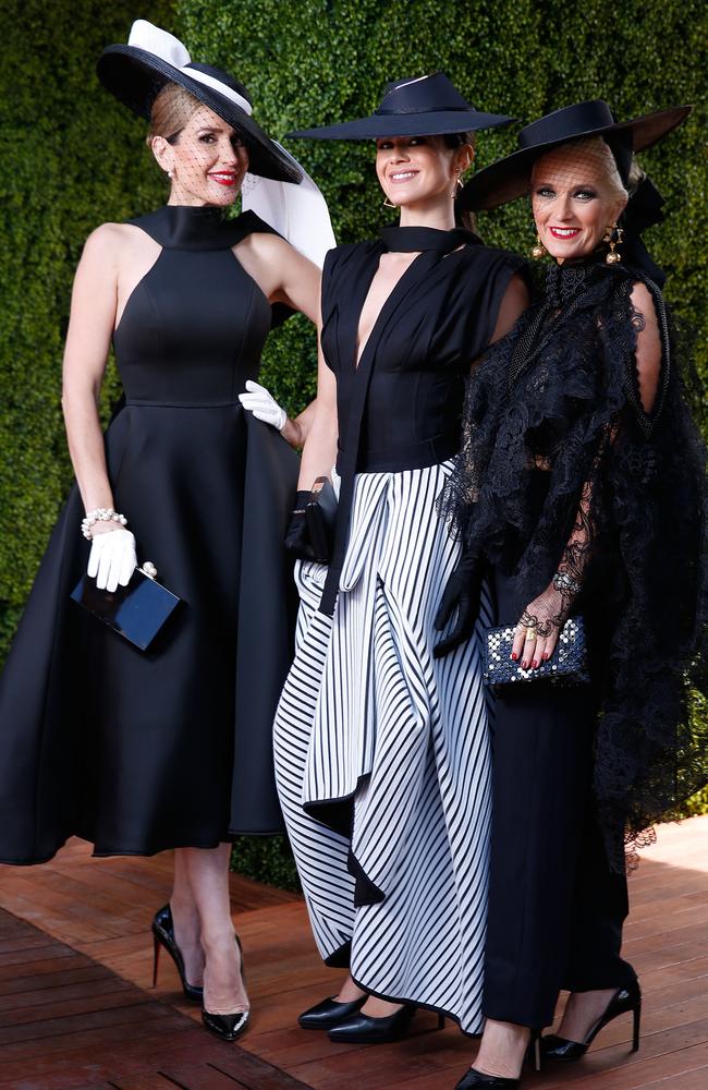 Women's Myer Fashions on the Field daily winner Montelle Mondello (centre) poses with second place winner Tanya Lazarou (left) and third place winner Lisa March (right) at The Park. Picture: Daniel Pockett, Getty Images.