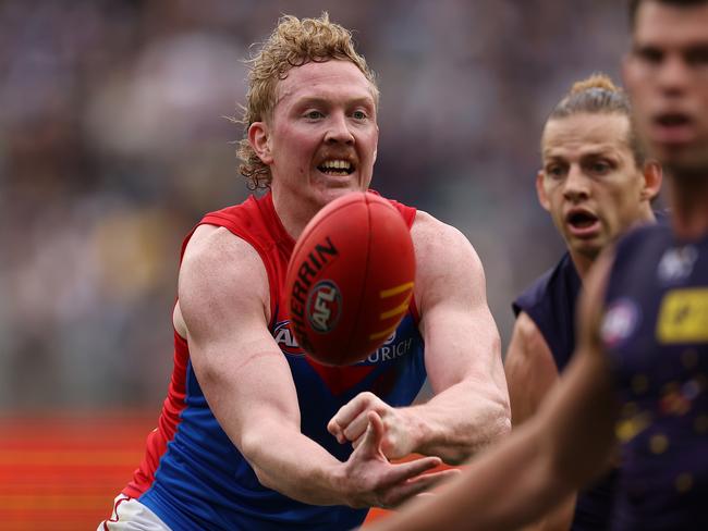 Mick McGuane says Melbourne should definitely consider trading Clayton Oliver. Picture: Getty Images