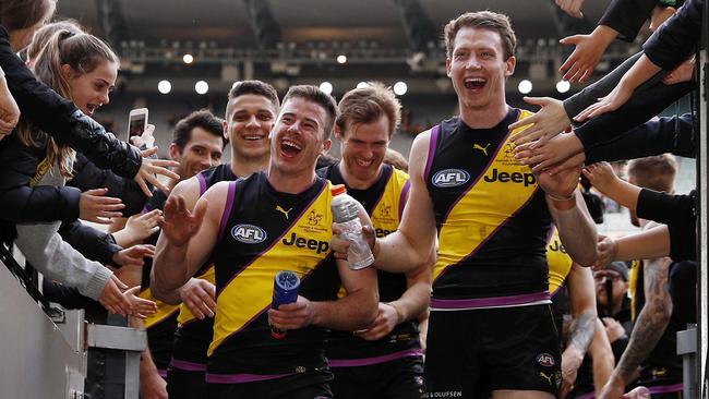 Jack Higgins and Dylan Grimes lead Richmond off the MCG.