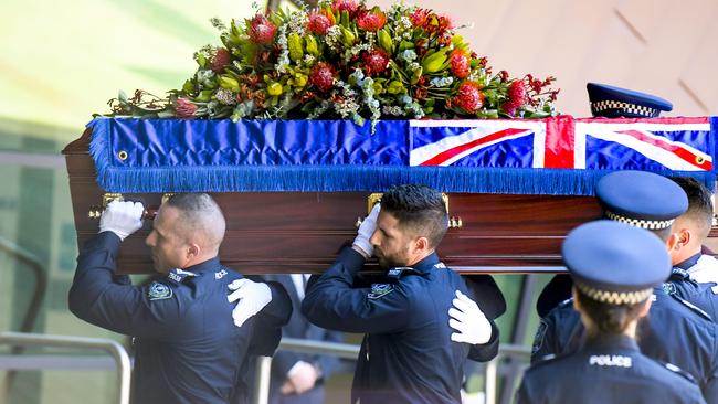 Officers carried Brevet Sergeant Jason Doig‘s coffin into the service. Picture: NCA NewsWire / Roy VanDerVegt