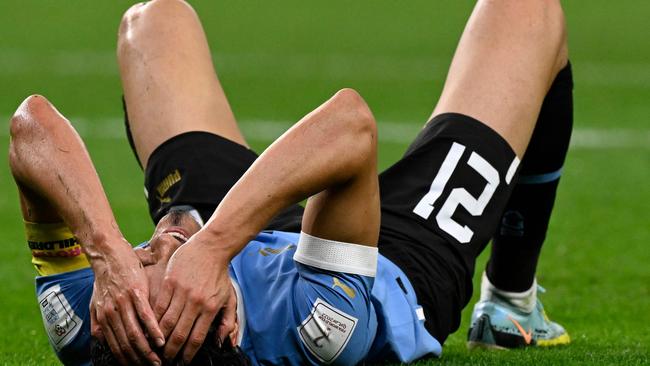 Uruguay's forward #21 Edinson Cavani reacts before appealing for a penalty. (Photo by Alfredo ESTRELLA / AFP)