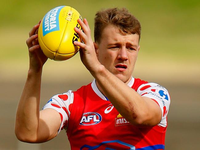 MELBOURNE, AUSTRALIA - MARCH 27: Jack Macrae marks the ball during a Western Bulldogs AFL training session at Whitten Oval  on March 27, 2018 in Melbourne, Australia.  (Photo by Darrian Traynor/Getty Images)