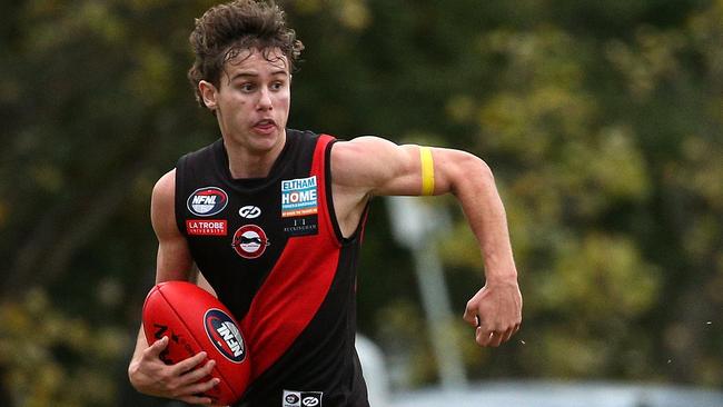 NFL: Eltham v Thomastown: Jason Mccormick of Eltham runs forward on Saturday May 14, 2022, in Eltham, Australia.Picture: Hamish Blair