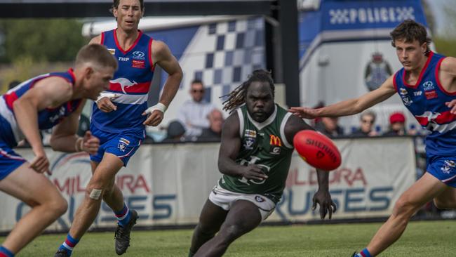 Imperials Anthony McDonald-Tipungwuti competes with three Wentworth opponents in the grand final. Picture: Noel Fisher