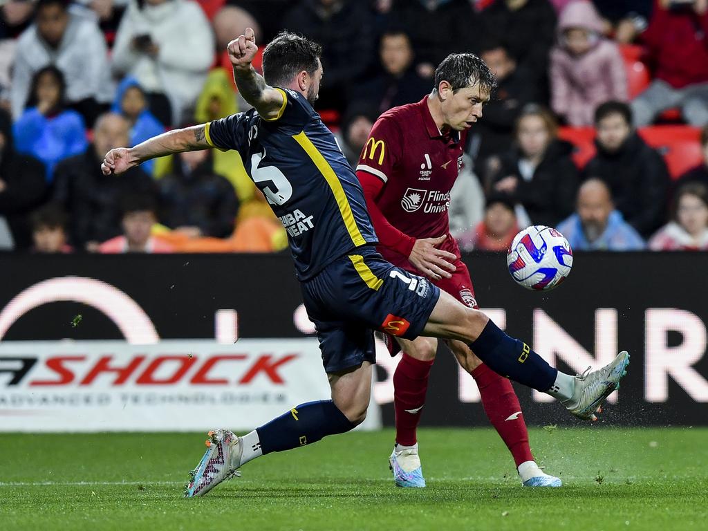 Adelaide United’s Craig Goodwin (right) hopes to inspire his side against Wellington Phoenix. Picture: Mark Brake/Getty Images