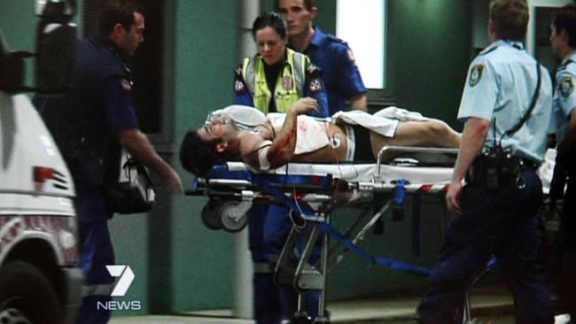 Ambulance staff and police attend to Fadi Ibrahim after he was shot five times in a car in 2009. Roger Rogerson reached out to John Ibrahim after the incident.