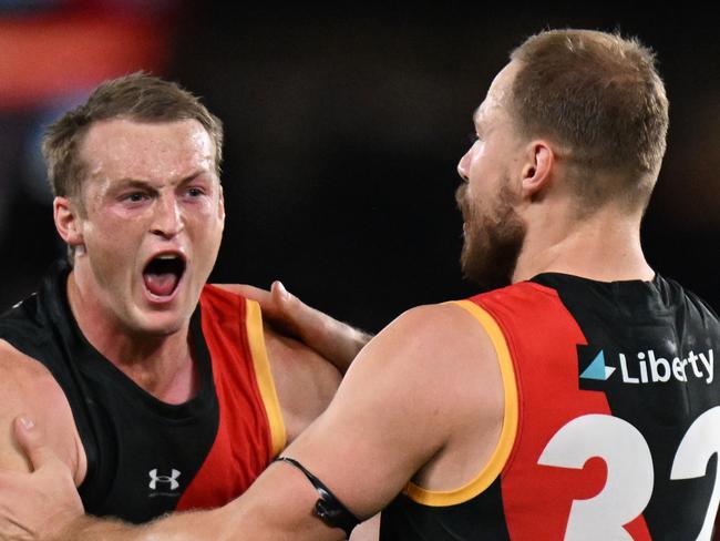 MELBOURNE, AUSTRALIA – MAY 11: Mason Redman of the Bombers celebrates kicking a goal during the round nine AFL match between Essendon Bombers and Greater Western Sydney Giants at Marvel Stadium, on May 11, 2024, in Melbourne, Australia. (Photo by Daniel Pockett/AFL Photos/via Getty Images)