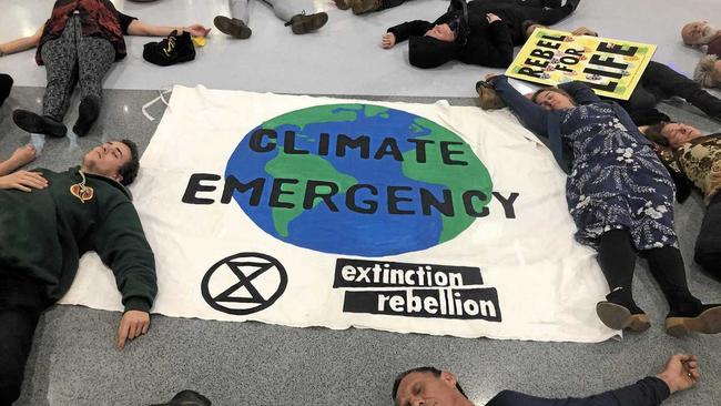 CLIMATE: The local Extinction Rebellion movement, pictured at a recent activity at Lismore Shopping Square, is one of the organisation that called for the protest this weekend. Picture: Sophie Moeller