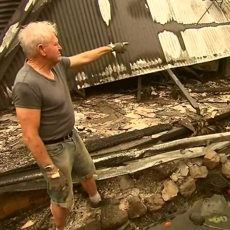 Ron Coote inspects the devastating damage. Picture: Channel 9/9News