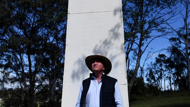 Barnaby Joyce poses for photographs after winning the New England by-election