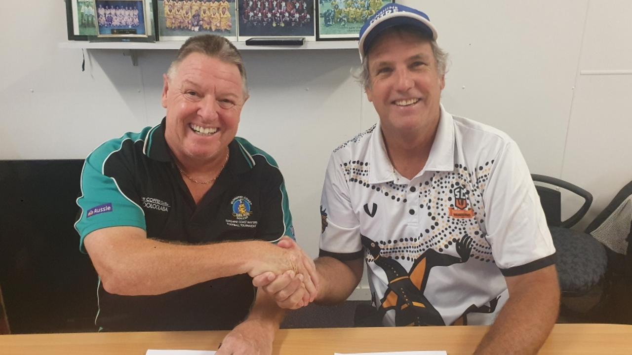 Sunshine Coast Supa Oldies Soccer president Bob Smoothey and Buderim Wanderers Football Club president Glenn Duncan conclude their historic agreement signing.