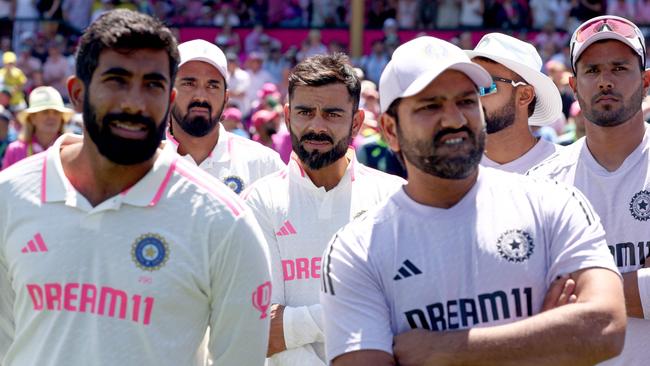 India’s Jasprit Bumrah, left, Virat Kohli, centre, and deposed captain Rohit Sharma, right. Picture: AFP