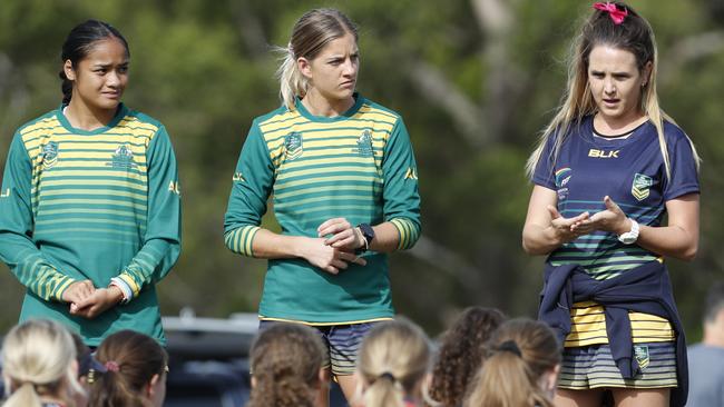 Faith Nathan, left was part of the Australian women’s touch football women's team before her switch to rugby.