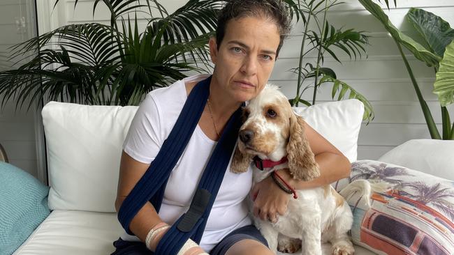 Maria Temelkos, 49, with her cocker spaniel Jax after being attacked by a dog at Rainbow Bay. Picture: Sam Stolz