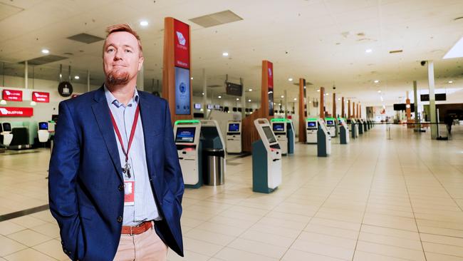 Queensland Airports Limited CEO Chris Mills in an empty Gold Coast Airport check in area. Picture: Scott Powick