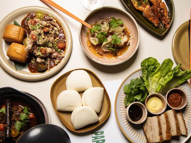 Crispy pork belly bao, dumplings and other dishes at Paper Tiger, Rundle St