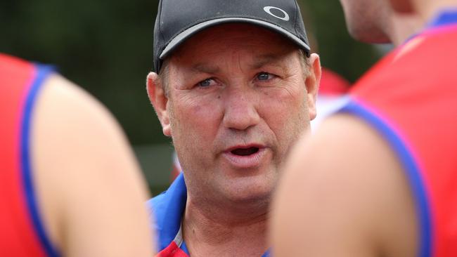 Rob Fletcher speaks to his Mernda players.