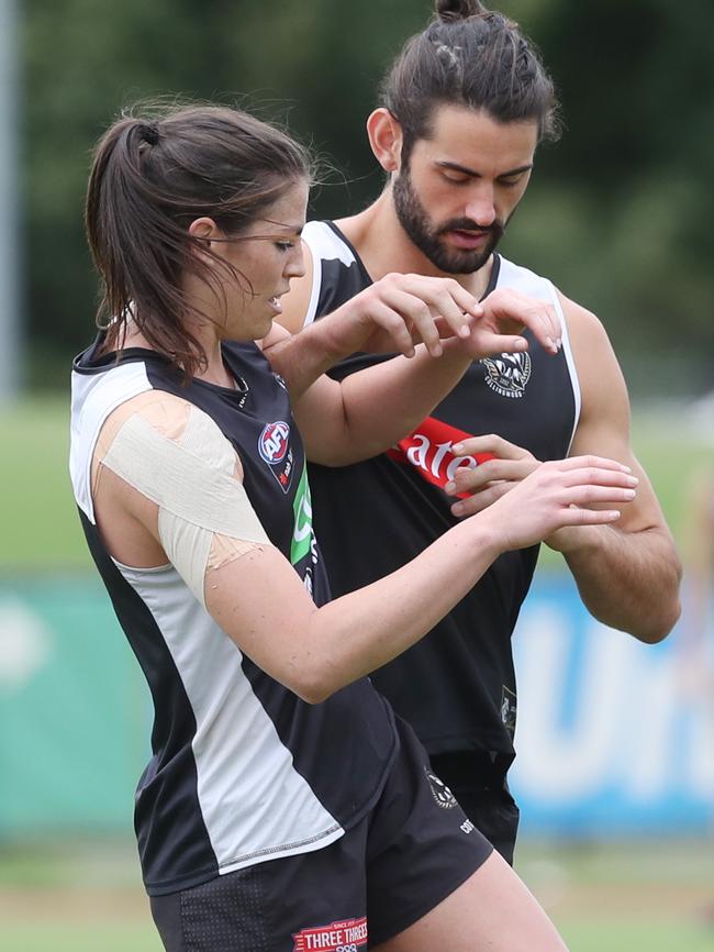 Brodie Grundy tangles with Eliza Hynes. Picture: David Crosling