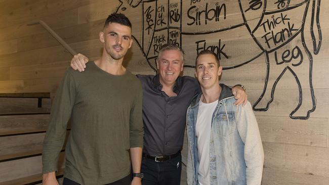 President Eddie McGuire with 2010 captain Nick Maxwell and present skipper Scott Pendlebury at Collingwood’s premiership reunion. Picture: Michael Klein