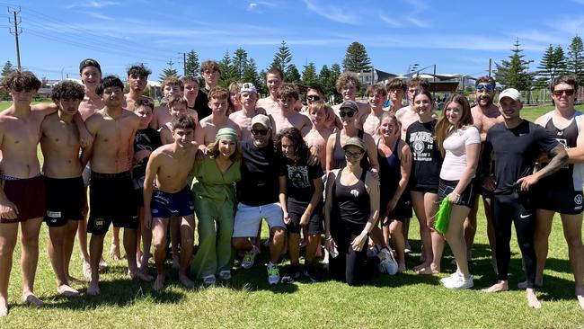 Mirella Smith with members of the Port District Football Club at a fundraiser for the family in December. Picture: Supplied