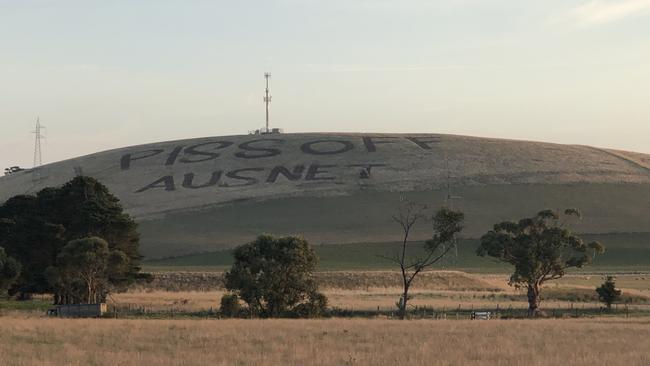 The Fraser family ploughed the words “Piss off Ausnet” into their property to protest The Western Victoria Transmission Network Project.