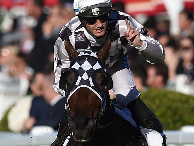 Jockey Damian Brown rides Miss Cover Girl to win race 8, the Tattersal's Club Tiara, during the Tattersal's Race Day at Eagle Farm racecourse in Brisbane, Saturday, June 25, 2016. (AAP Image/Dan Peled) NO ARCHIVING, EDITORIAL USE ONLY