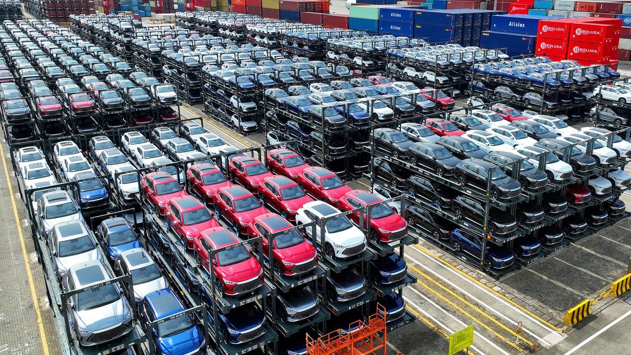 Electric vehicles stacked up for shipping at Suzhou Port in China. Picture: AFP