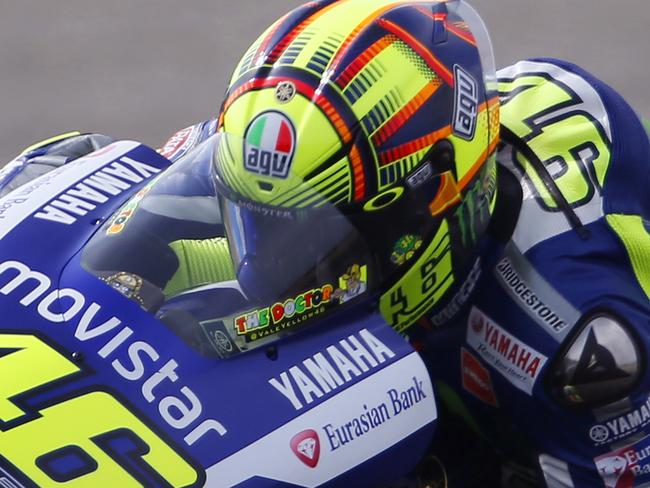 Italy's Valentino Rossi steers his Yamaha during third free practice session for the MotoGP Japanese Motorcycle Grand Prix at the Twin Ring Motegi circuit in Motegi, north of Tokyo, Saturday, Oct. 10, 2015. (AP Photo/Shizuo Kambayashi)