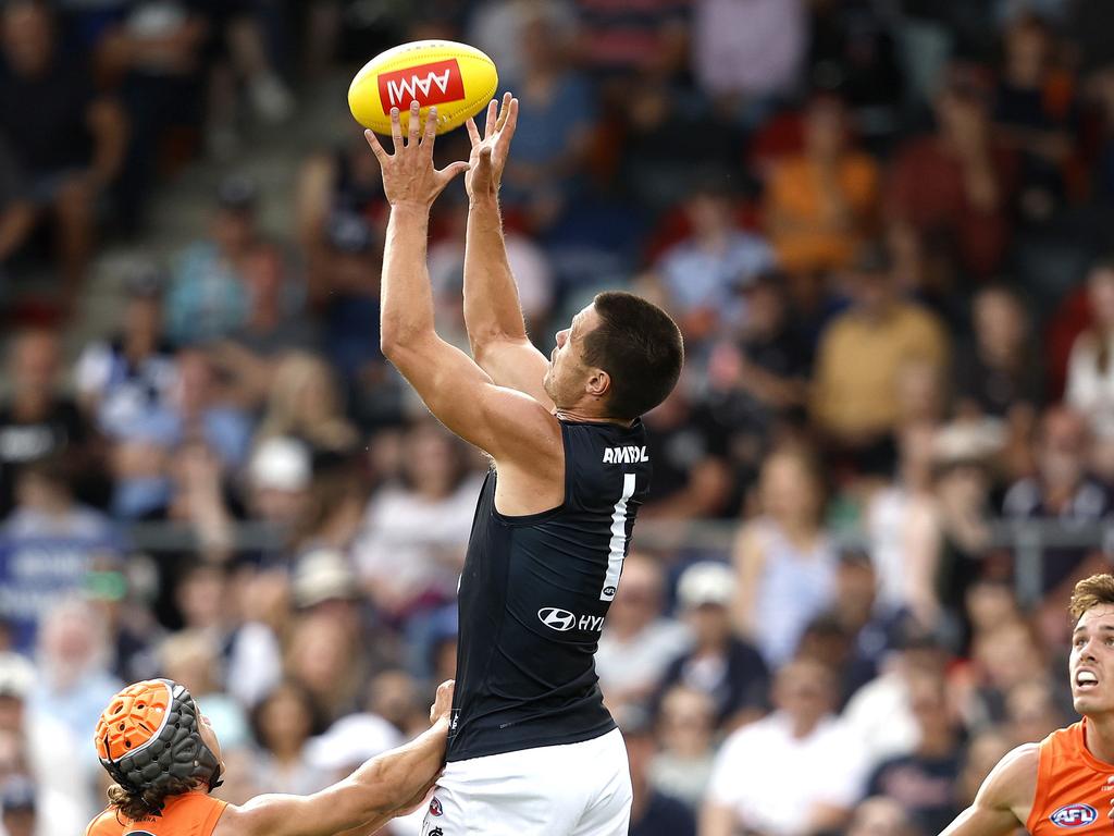 Jack Silvagni climbs high to mark in his new defensive role.