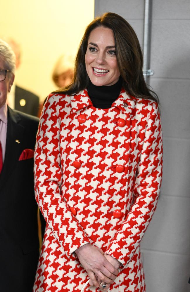 The Princess of Wales wears a houndstooth coat — which fashion observers viewed as a homage to a Moschino jacket worn by Princess Diana — to the Wales vs England Six Nations Match. Picture: Matthew Horwood/Getty Images