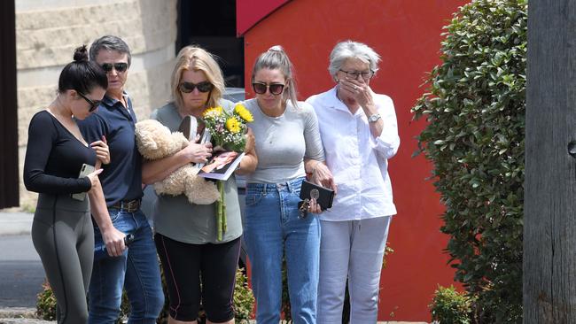 Libby Ruge's family visit the site where she was run down by a vehicle outside the Collegians Club in Wollongong. Picture: NCA NewsWire/Simon Bullard