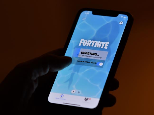 Online games, such as Fortnite and Call of Duty, will be added to the social media sites forced to erase bullying messages to children or threats to adults within 24 hours. Picture: AFP