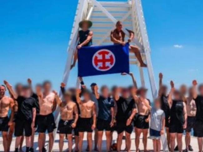 A shocking image of a group of Neo-Nazis performing a Hitler salute has been captured at Point Ormond in Elwood.