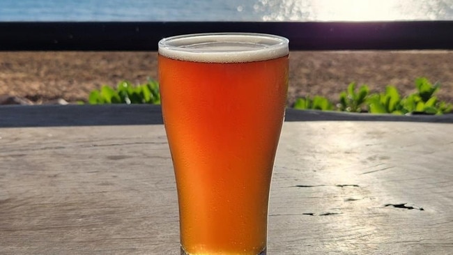 Darwin Brewing Co beer overlooking the ocean. Picture: Kate Dinning