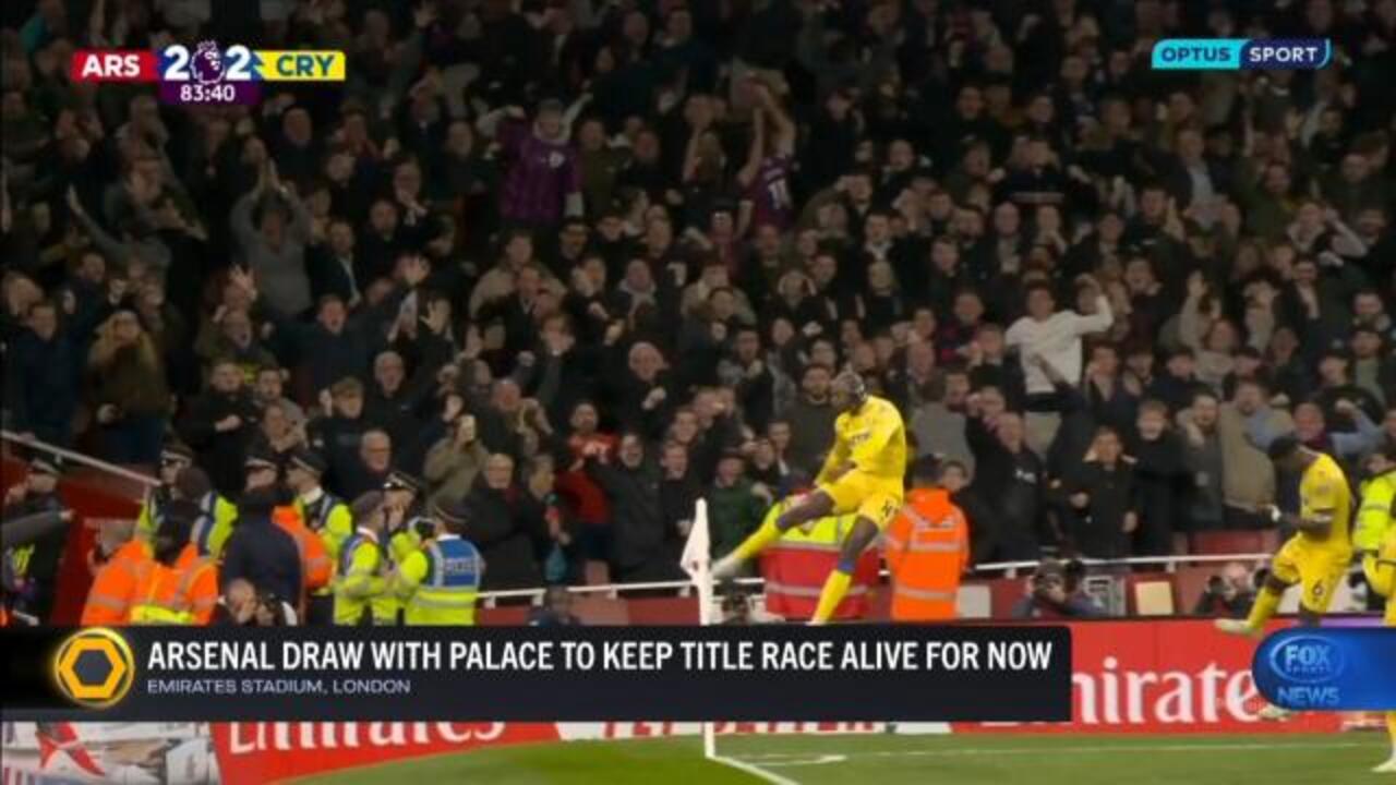 Gunners draw to keep title race alive