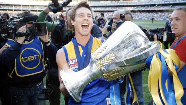 Ben Cousins holds the premiership cup after the Eagles’ grand final win in 2006.