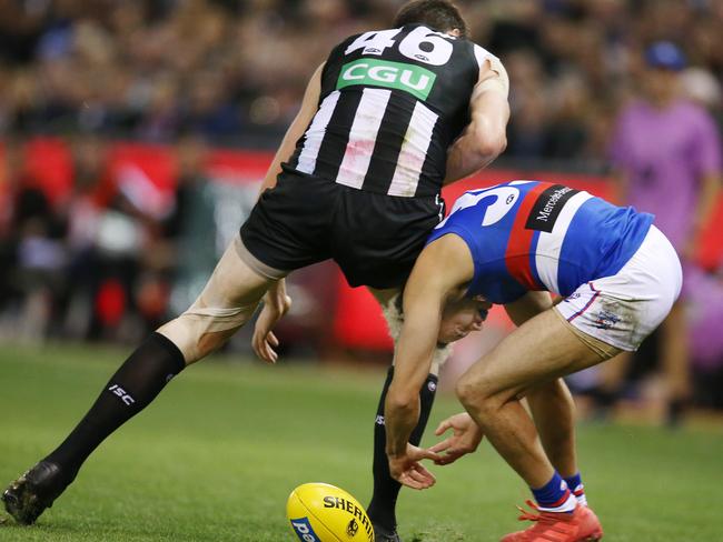 Mason Cox copped a $2000 fine for this high bump. Picture: Michael Klein